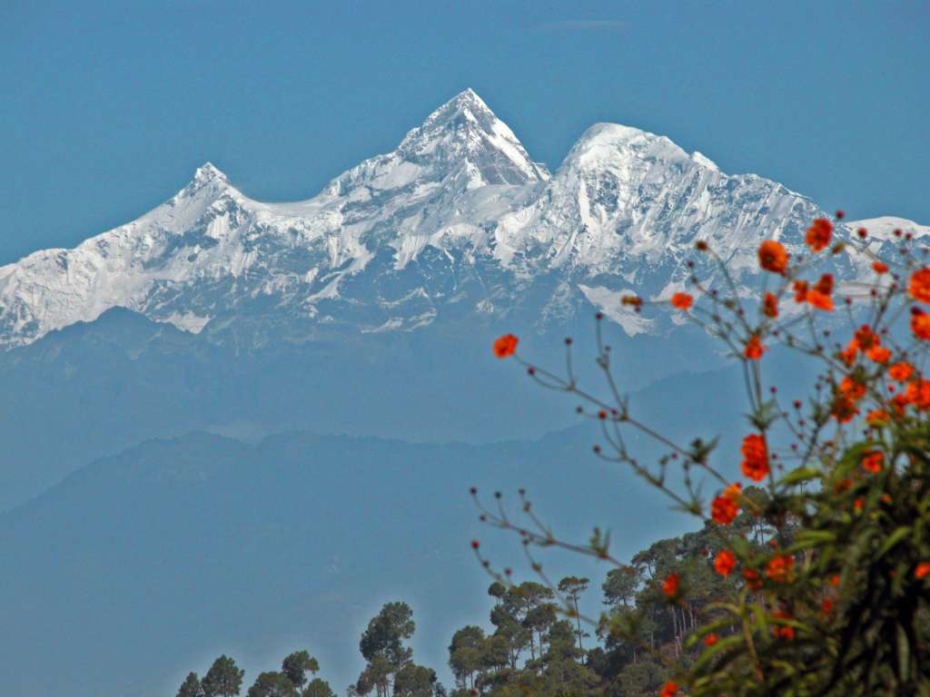 Manaslu 01 02 Himal Chuli From Top Of Hill On The Way To Arughat We stopped at the top of the ridge on the road to Arughat, and had a beautiful view of Himal Chuli (7893m) in the middle, Himal Chuli West (7540m) on the left, and Baudha Peak (6672m) on the right. The first ascent of Himal Chuli was on May 24, 1960 by Japanese Hisashi Tanabe and Masahiro Harada. Himal Chili West Peak was first climbed on May 7, 1978 by Japanese Yoshio Ogata and Kazuhiro Sugeno. Baudha Peak was first climbed on May 2, 1970 by Japanese Yoshiyuki Kobayashi and Kiyoyasu Shibata.